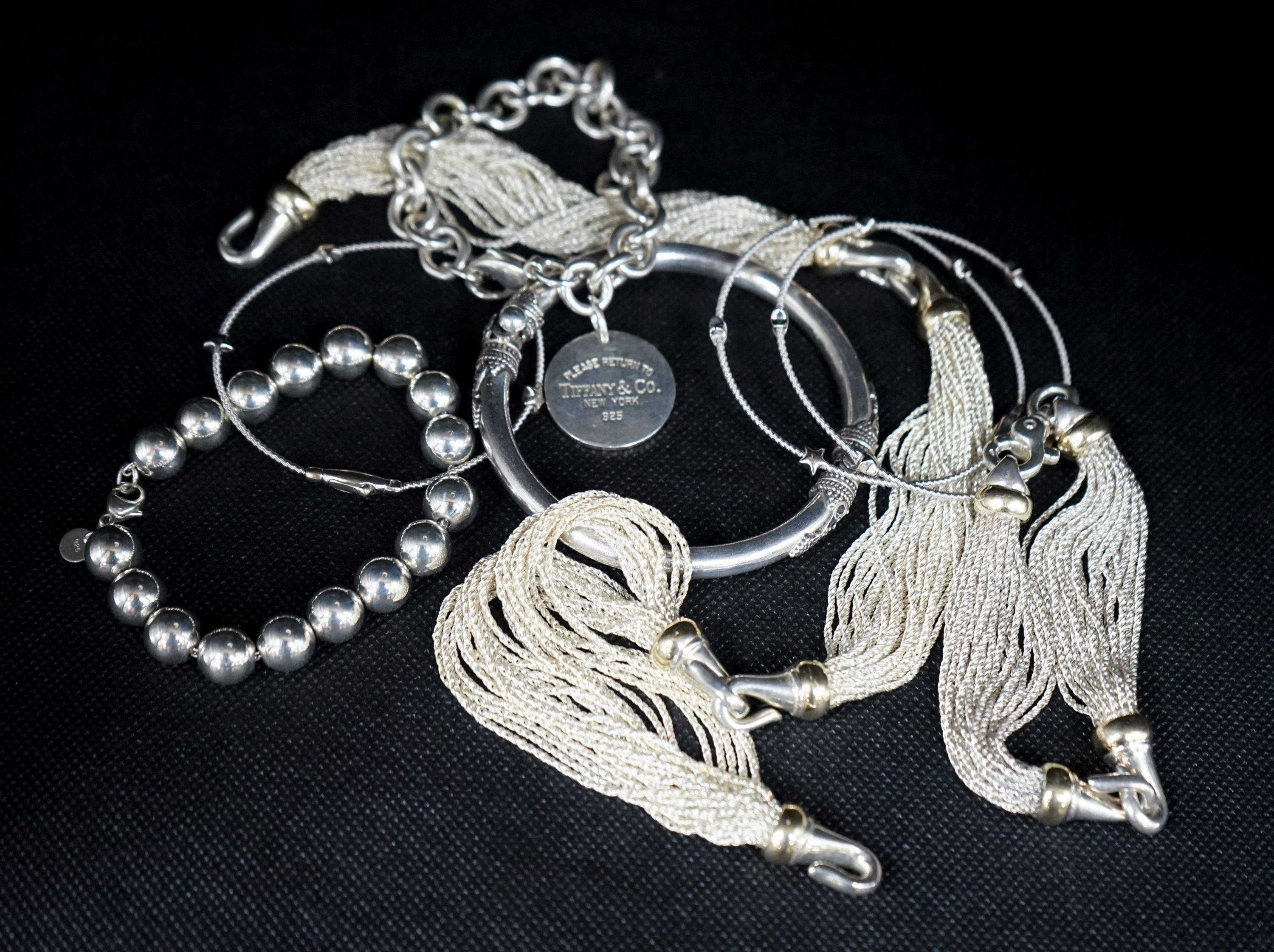 A small group of white metal and 925 jewellery including torsade necklace and bracelet, etc
